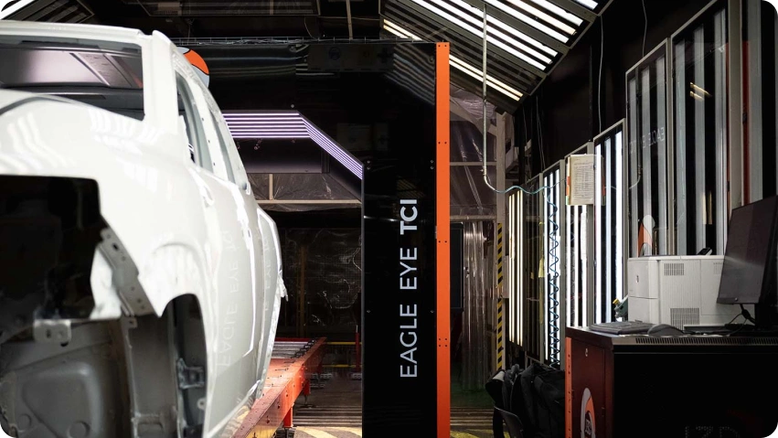Automotive inspection system with AI vision technology in manufacturing plant
